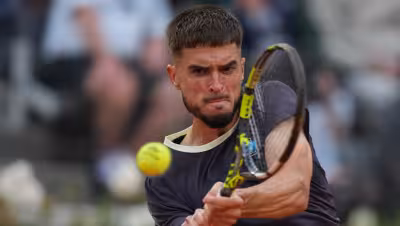 Lorenzo Musetti meets Casper Ruud in Rome after two-set win